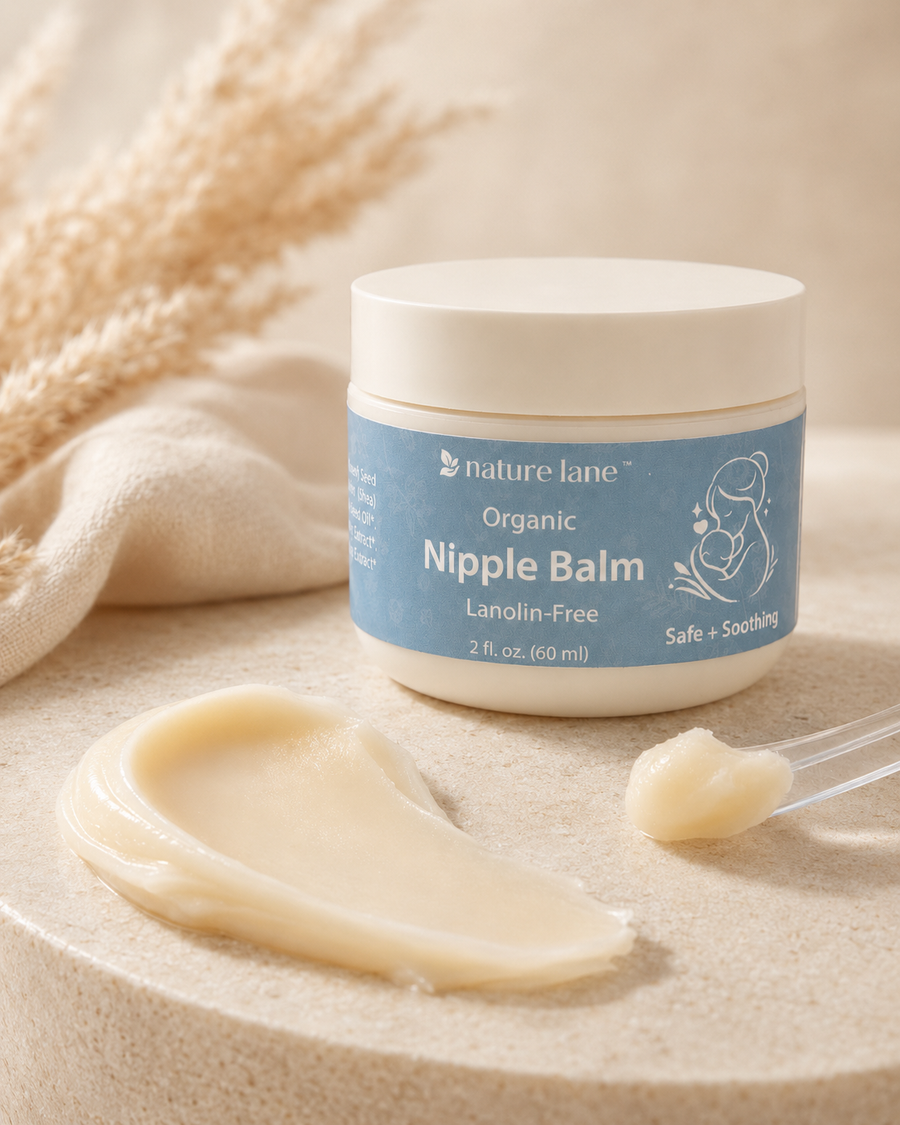 Rich balm texture beside Nature Lane Organic Nipple Balm jar